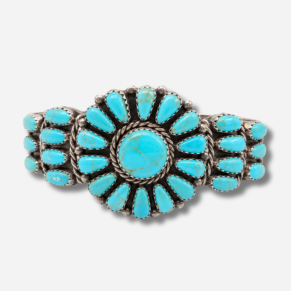 Bracelet Harpo BR01 en argent avec composition florale de turquoises naturelles serties à la main, pièce unique inspirée des bijoux Navajo.