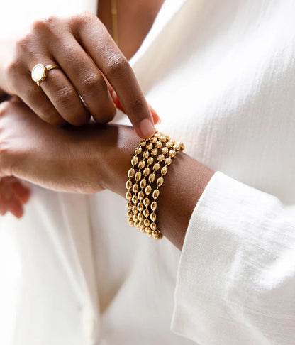 Bracelet Caddy ZAG en acier inoxydable doré à plusieurs rangs de mailles ovales