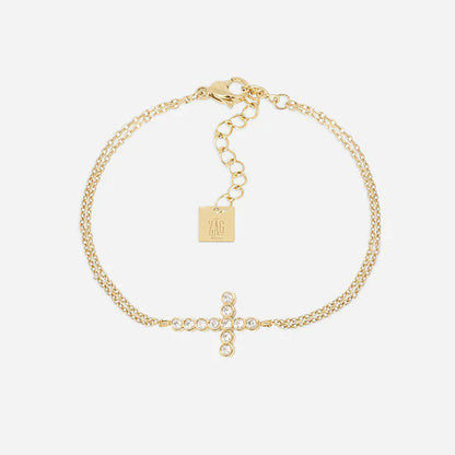 Bracelet Capizzi ZAG en acier inoxydable doré avec croix sertie de zirconiums