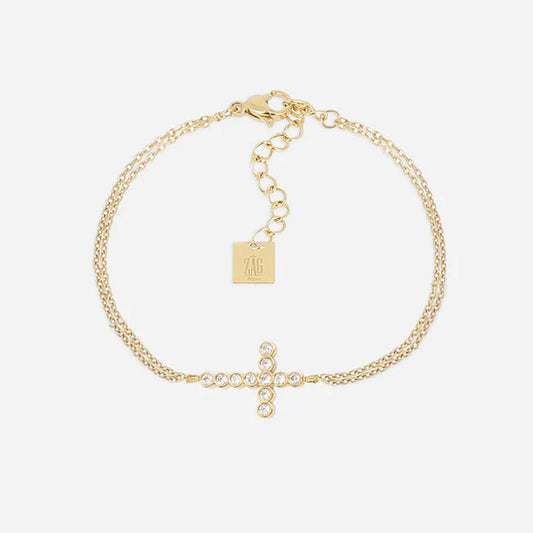 Bracelet Capizzi ZAG en acier inoxydable doré avec croix sertie de zirconiums