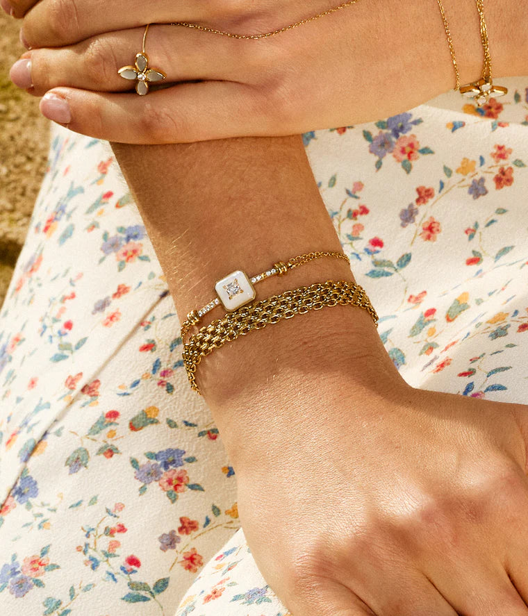 Bracelet Codex ZAG en acier inoxydable doré avec rectangle en nacre et zirconiums