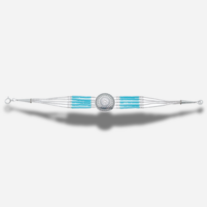Bracelet Concho Cinq Rangs Turquoise B310 Harpo avec concho centrale en argent massif et perles turquoise fabriqué à la main aux États-Unis.