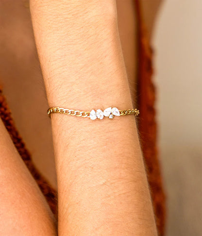Bracelet Cosia ZAG acier inoxydable doré pierres blanches zirconium femme Divinity Sète