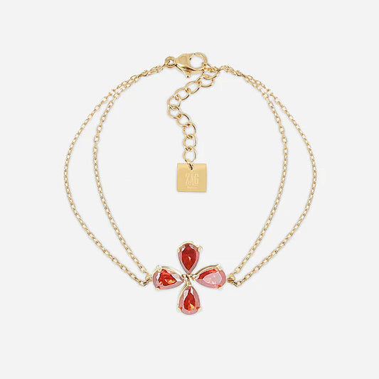 Bracelet Estial ZAG en acier inoxydable doré avec fleur à quatre pétales en cristaux