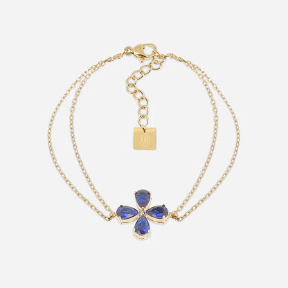 Bracelet Estial ZAG en acier inoxydable doré avec fleur à quatre pétales en cristaux