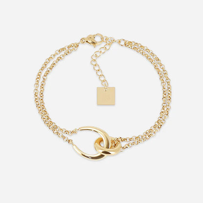 Bracelet Felik ZAG en acier inoxydable doré avec double chaîne et anneaux entrelacés