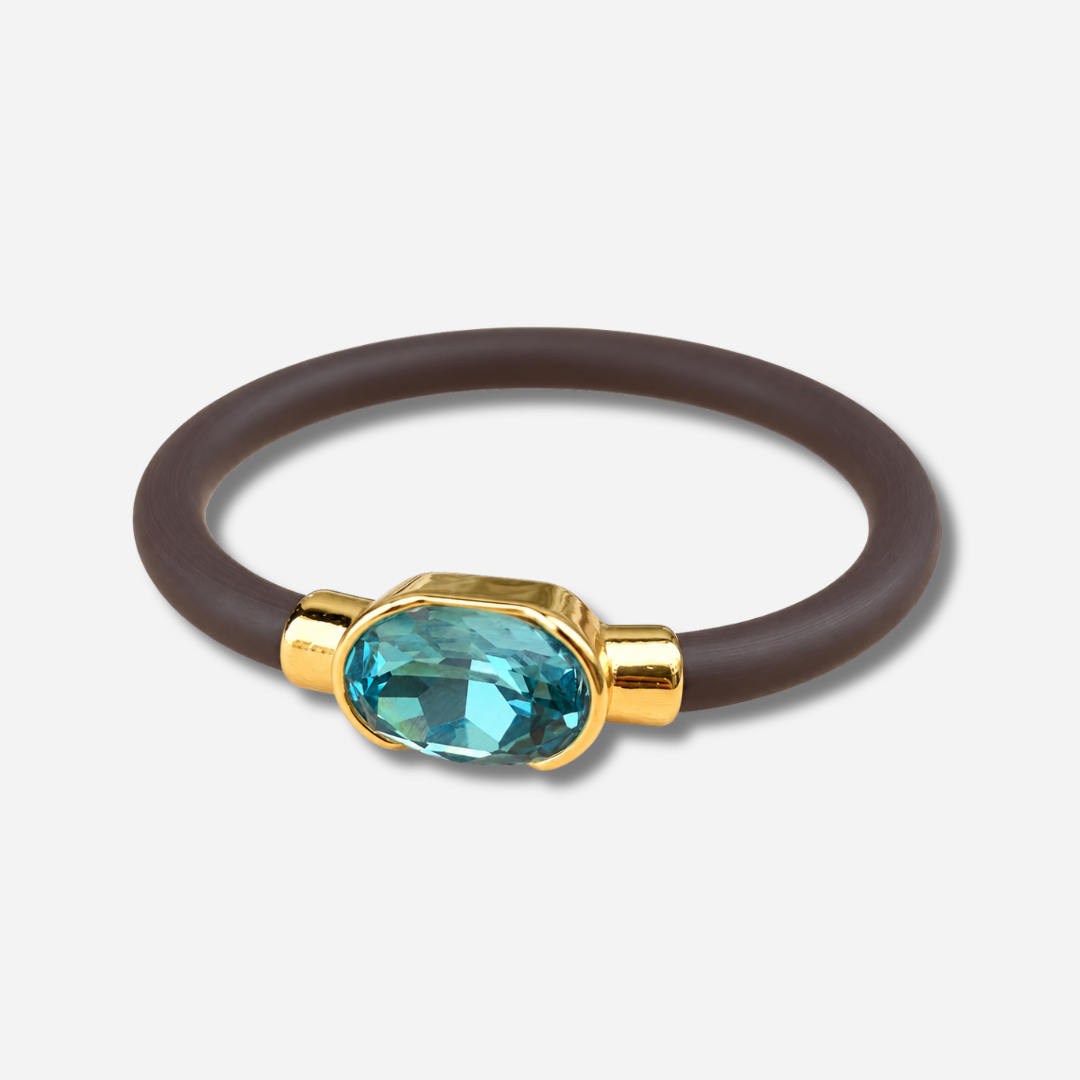 Bracelet Gala Bleu Lagon avec cristal ovale facetté bleu turquoise, monture dorée et bracelet marron