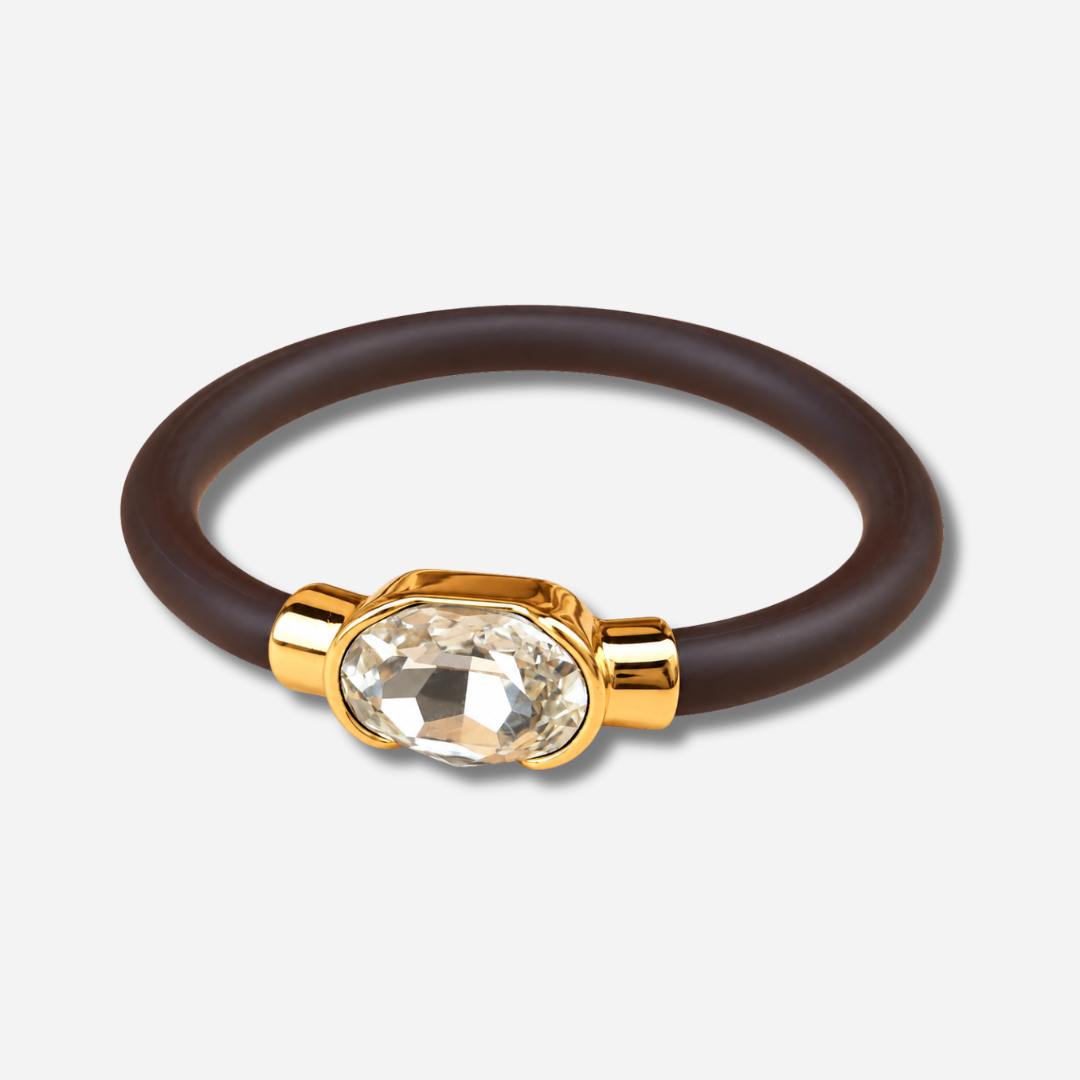 Bracelet Gala Cristal avec cristal ovale facetté transparent, monture dorée et bracelet marron