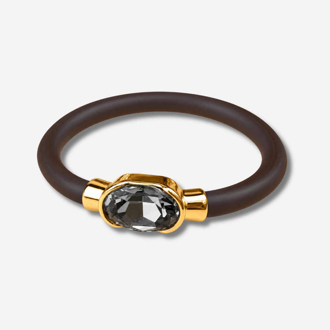 Bracelet Gala Gris avec cristal ovale facetté gris fumé, monture dorée et bracelet marron