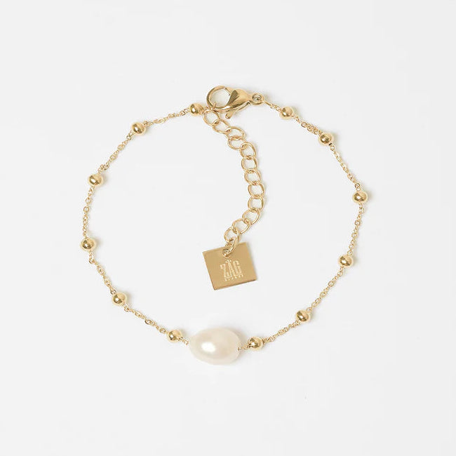 Bracelet Izia ZAG en acier inoxydable doré avec véritable perle d’eau douce