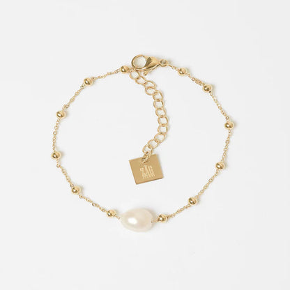Bracelet Izia ZAG en acier inoxydable doré avec véritable perle d’eau douce