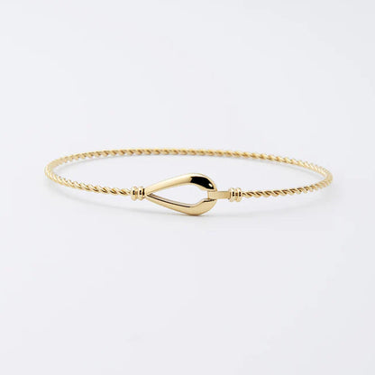 Bracelet jonc Kendall ZAG acier inoxydable doré bracelet fin torsadé fermoir design femme Divinity Sète