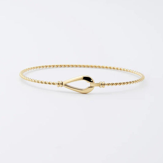 Bracelet jonc Kendall ZAG acier inoxydable doré bracelet fin torsadé fermoir design femme Divinity Sète