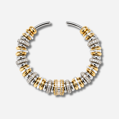 Bracelet jonc Sigal Luma bicolore or et argent avec anneaux sertis d'oxydes de zirconium, bijou chic et élégant.