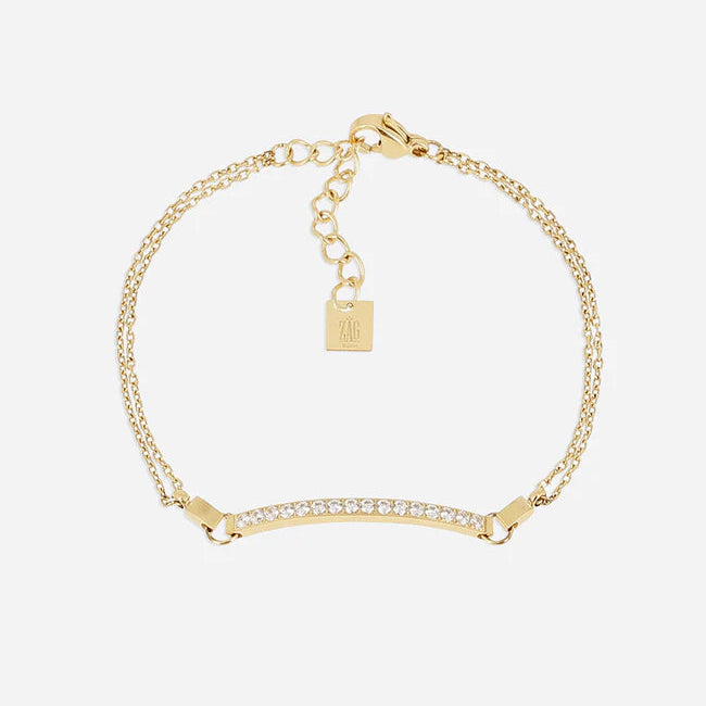 Bracelet Lauria Zag doré avec barre sertie de strass