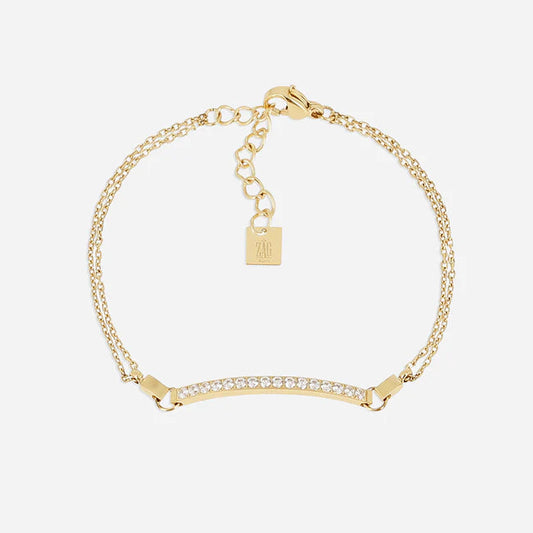 Bracelet Lauria Zag doré avec barre sertie de strass