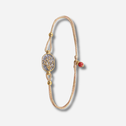 Bracelet Nonza Corail Argenté Amadrina sur cordon réglable avec corail doré, pavage de paillettes argentées et perle de corail naturelle