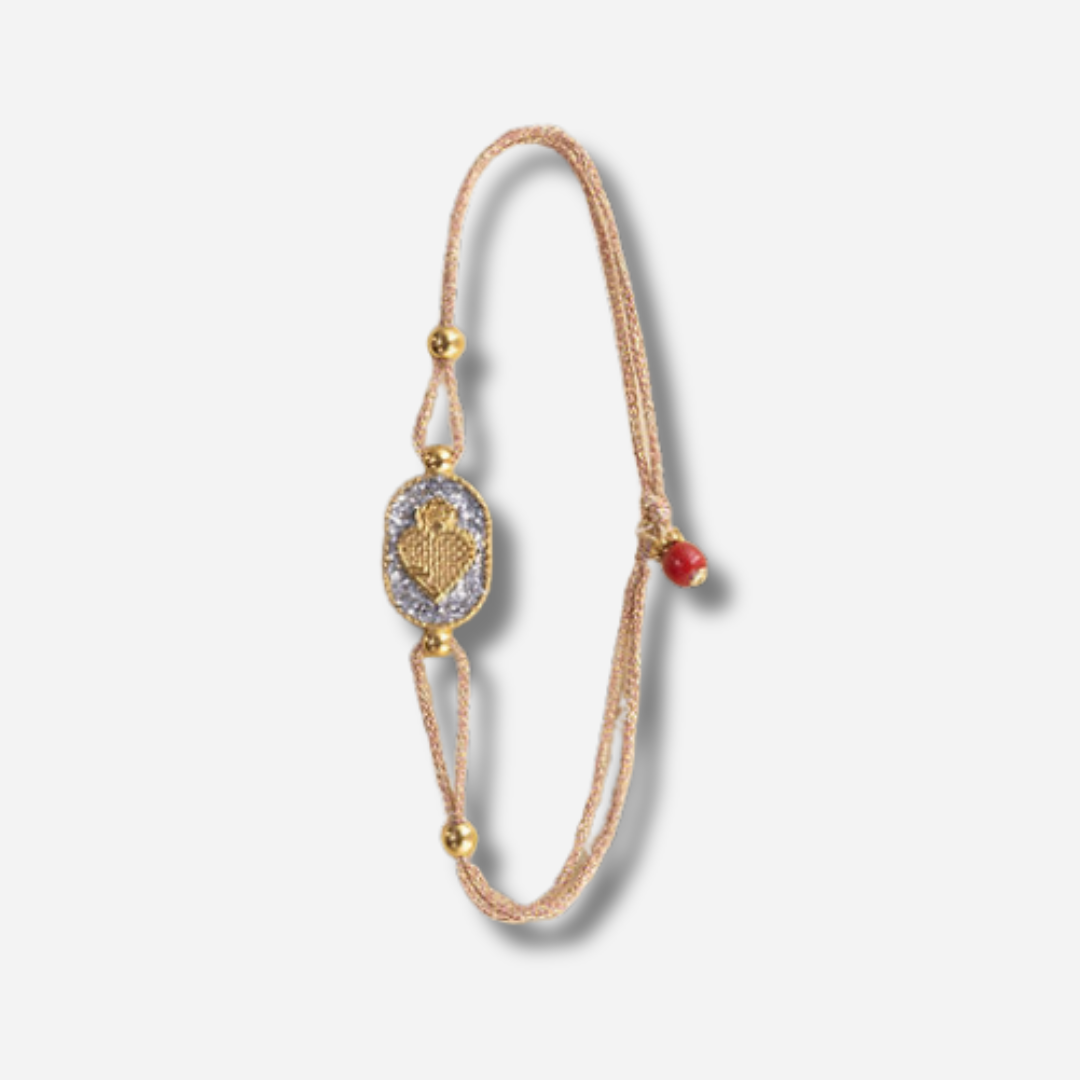 Bracelet Nonza Ex-Voto Argent Amadrina sur cordon réglable avec Ex-Voto doré, pavage de paillettes argentées et perle de corail naturelle