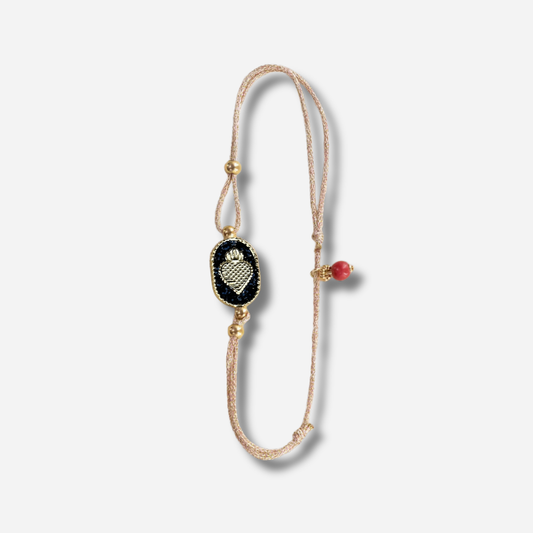 Bracelet Nonza Ex-Voto Noir Amadrina Corse avec cœur doré, paillettes noires et perle de corail
