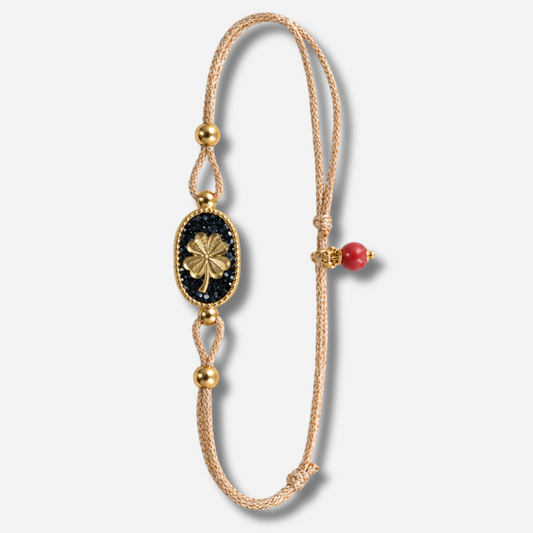 Bracelet Nonza Trèfle Noir Amadrina Corse avec médaillon noir pailleté et trèfle doré
