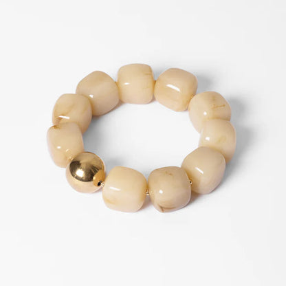 Bracelet Œdipe ZAG en grosses perles de résine colorée avec perle dorée