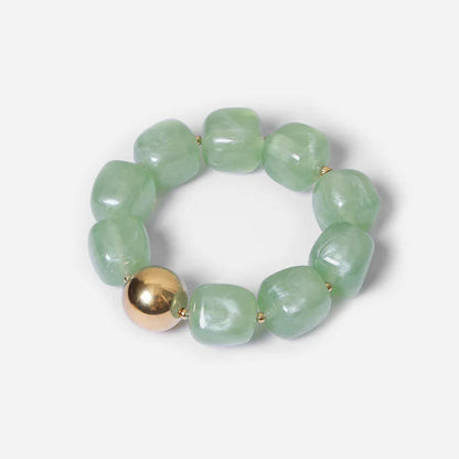 Bracelet Œdipe ZAG en grosses perles de résine colorée avec perle dorée
