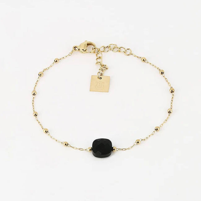 Bracelet Pablo ZAG en acier doré avec perles dorées et pierre noire facettée