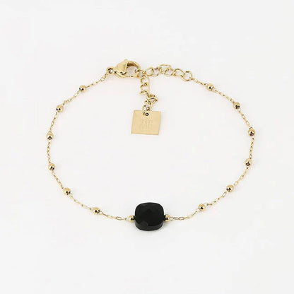 Bracelet Pablo ZAG en acier doré avec perles dorées et pierre noire facettée