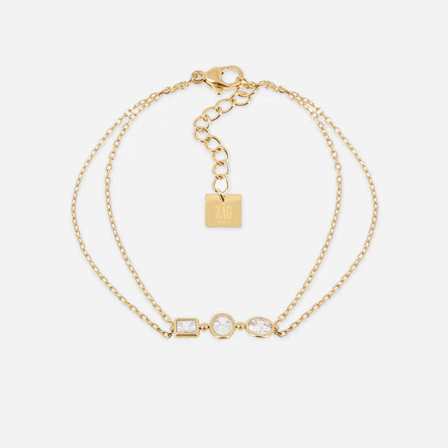 Bracelet Pardu ZAG en acier inoxydable doré avec trois zirconiums de formes variées