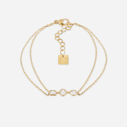 Bracelet Pardu ZAG en acier inoxydable doré avec trois zirconiums de formes variées