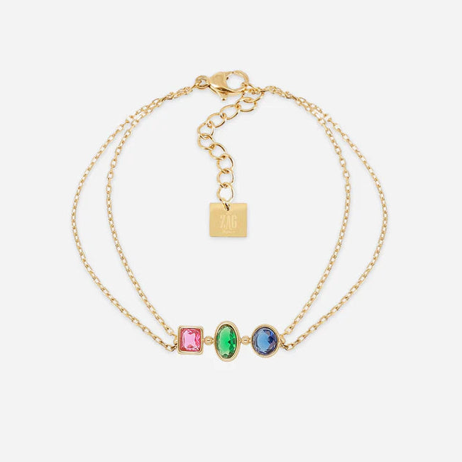 Bracelet Pardu ZAG en acier inoxydable doré avec trois zirconiums de formes variées