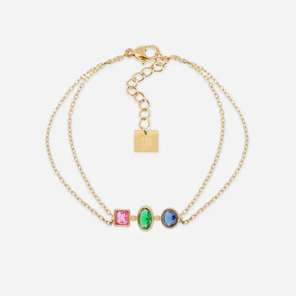 Bracelet Pardu ZAG en acier inoxydable doré avec trois zirconiums de formes variées