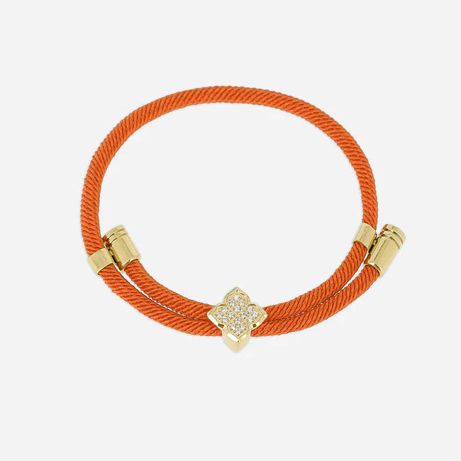 Bracelet Rezza ZAG en acier inoxydable doré avec motif trèfle serti de zirconiums et cordon coloré