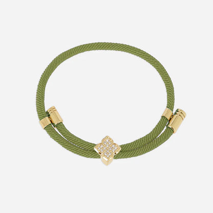 Bracelet Rezza ZAG en acier inoxydable doré avec motif trèfle serti de zirconiums et cordon coloré