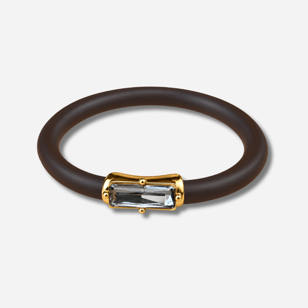 Bracelet Riva Gris avec cristal rectangulaire facetté gris, monture dorée et bracelet marron