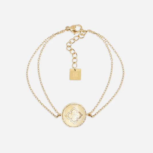 Bracelet Root ZAG en acier inoxydable doré avec médaille texturée et nacre blanche