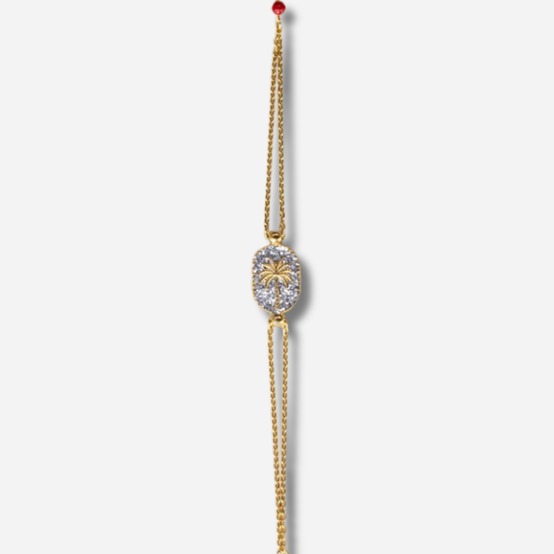 Bracelet Santa Giulia Palmier Argent Amadrina en acier inoxydable doré à l'or fin 18K avec palmier doré, pavage de paillettes argentées et perle de corail naturelle