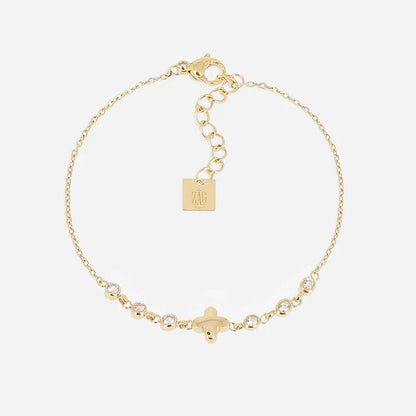 Bracelet Shanks ZAG en acier inoxydable doré avec trèfle central et zirconiums