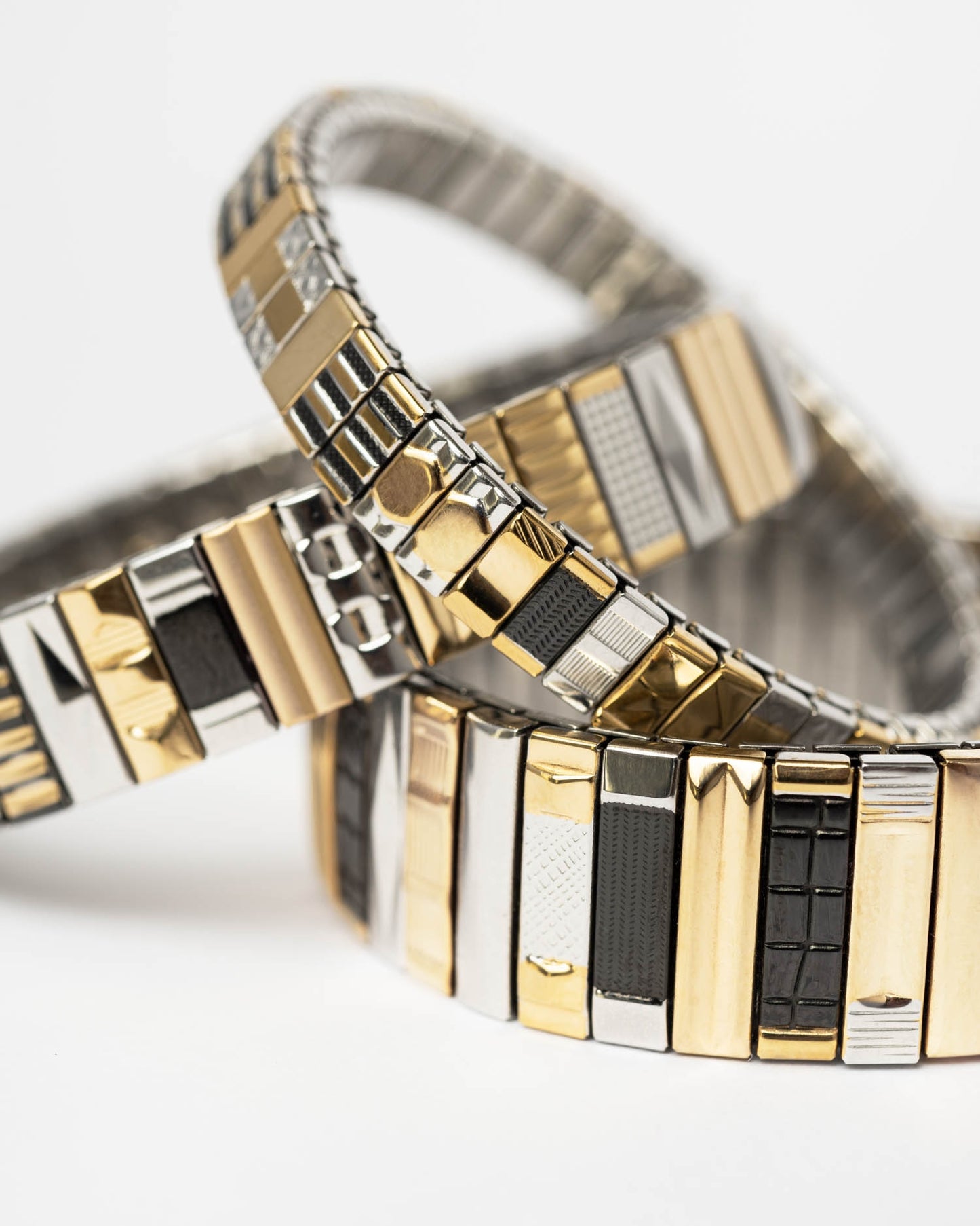 Bracelet Sigal bicolore métal extensible graphique