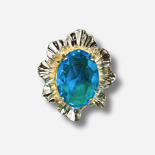 Détail broche corolle bleu pierre facettée