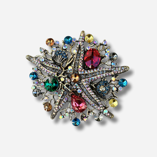 Broche bijou femme étoile de mer multicolore ornée de strass et pierres colorées