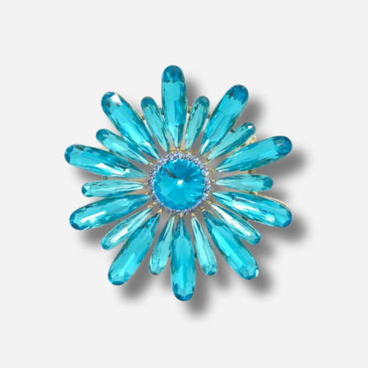 Broche bijou femme fleur bleue sertie de strass bleus