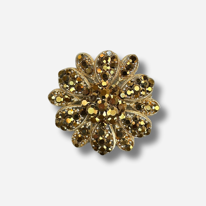 Broche bijou femme fleur dorée pavée de strass