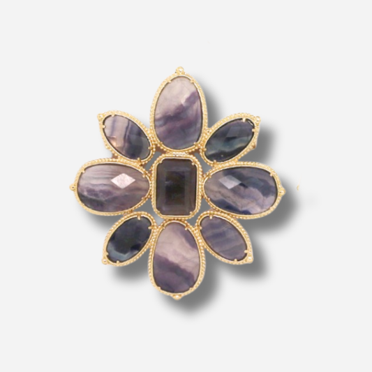 Broche bijou femme fleur violette aux pierres facettées sur monture dorée