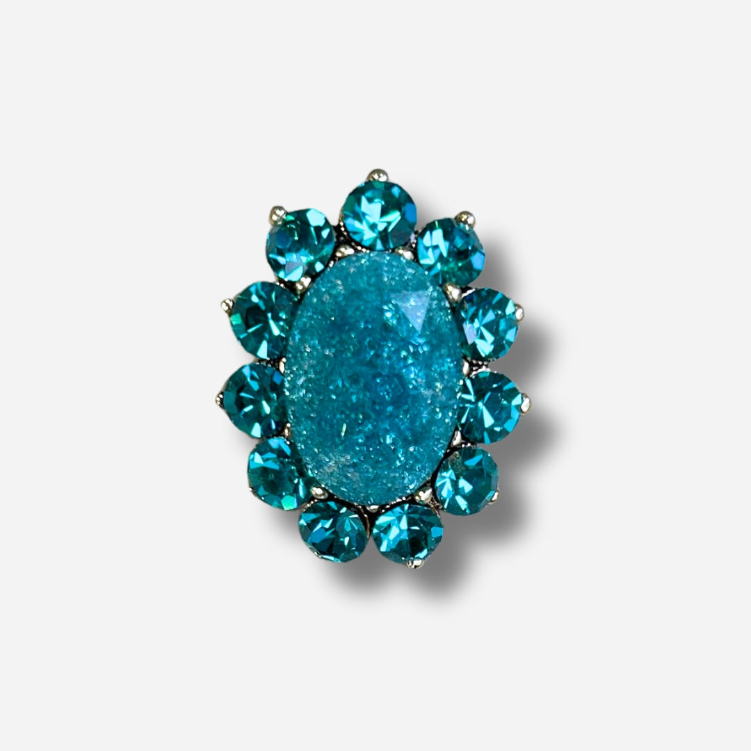 Broche bijou femme ovale bleu turquoise avec cabochon central et strass