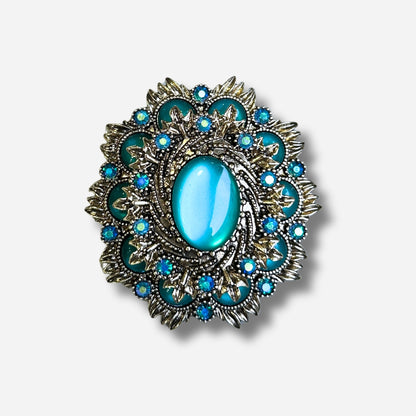 Broche bijou femme rosace bleu turquoise avec cabochon central