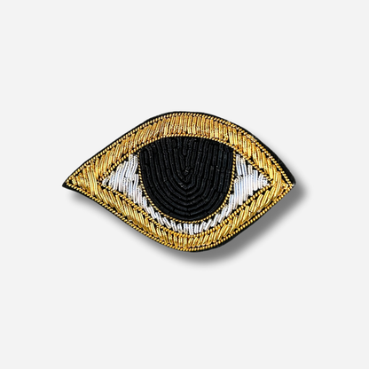 Broche tissu œil noir brodé avec détails dorés