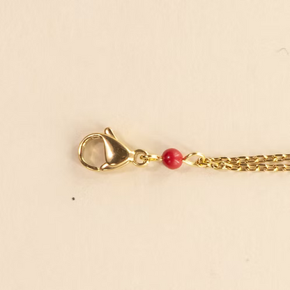 Bracelet Santa Giulia Madone Argent Amadrina en acier inoxydable doré à l'or fin 18K avec Madone dorée, pavage de paillettes argentées et perle de corail naturelle