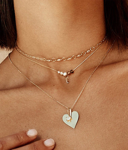 Collier Aito ZAG cœur acier inoxydable doré pendentif étoile zircon bijou femme Divinity Sète