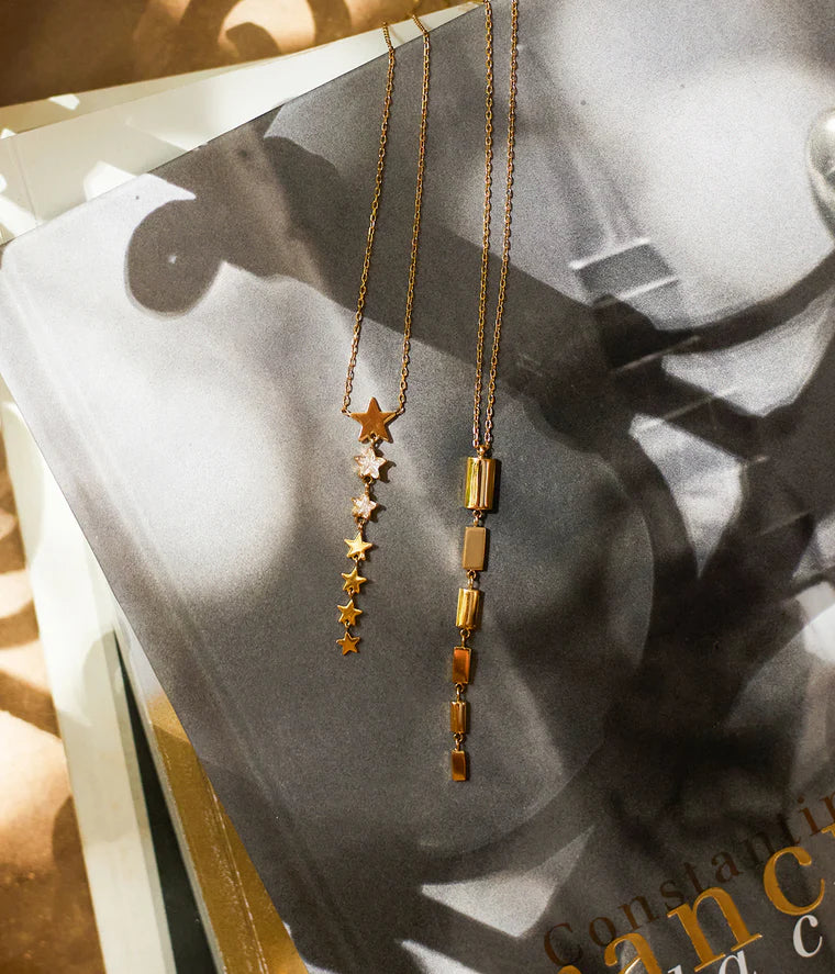 Collier Akiva ZAG étoiles pendantes acier inoxydable doré bijou femme Divinity Sète